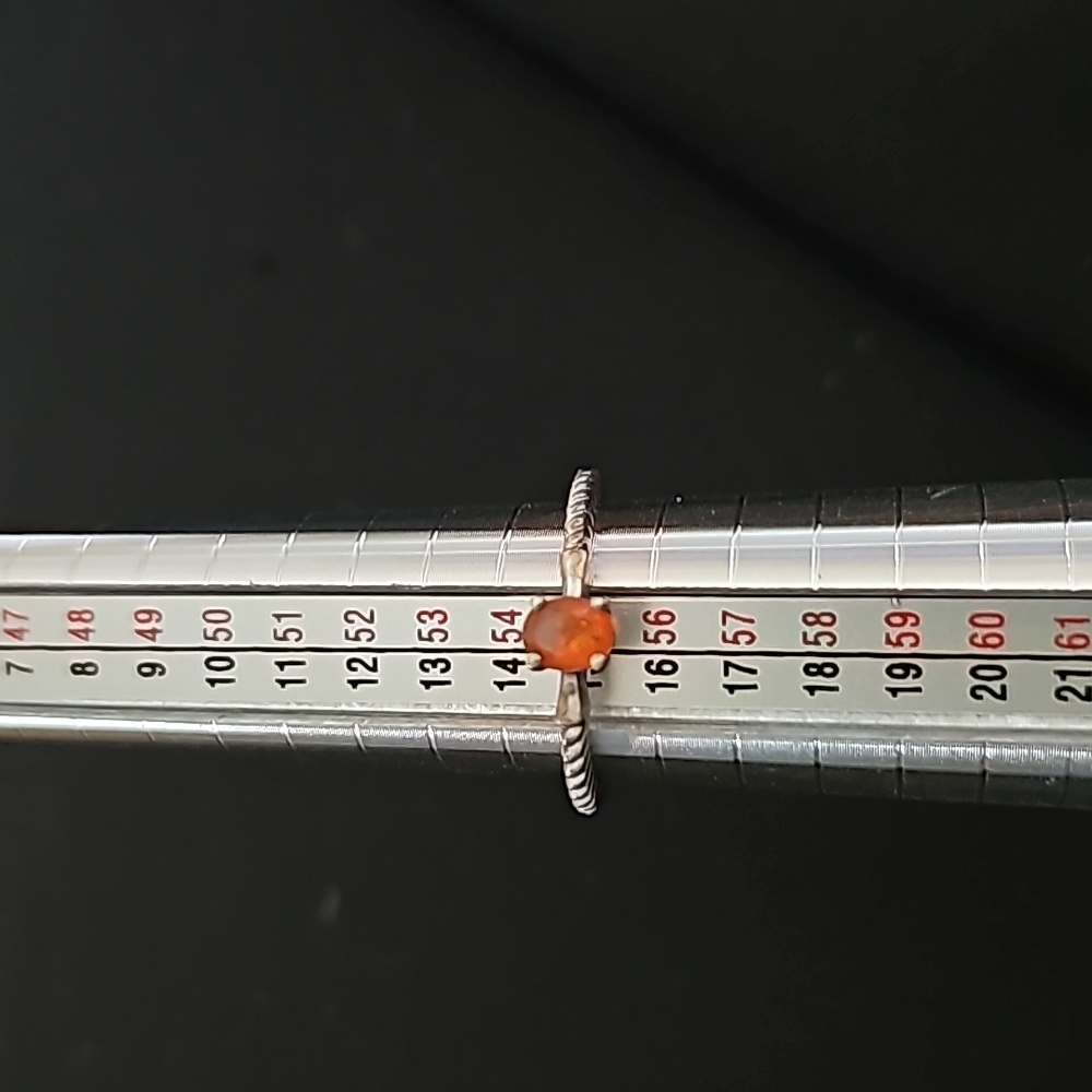 Sterling silver ring with orange center stone